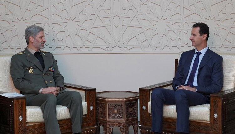 الرئيس السوري مع جنرال إيراني
