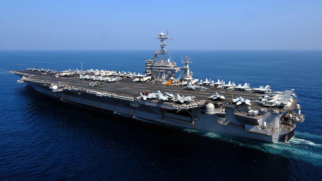 US to deploy carrier strike group in response to Iran