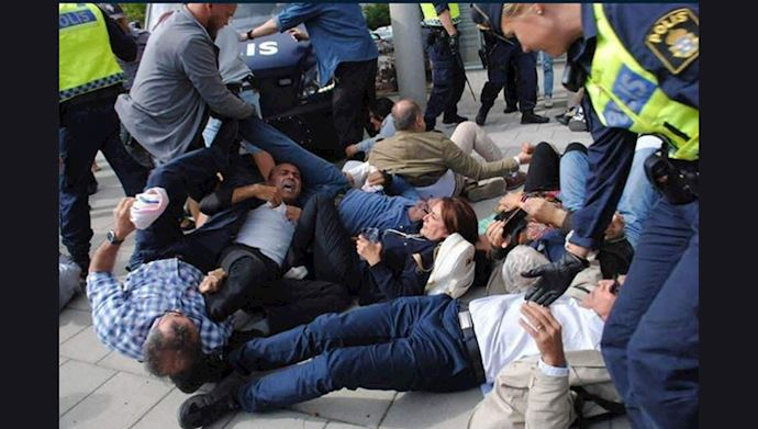واکنش شخصیت های سیاسی بە رفتار پلیس سوئد با معترضین بە حضور جواد ظریف