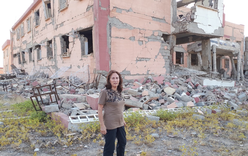 Amy L. Beam at secondary school in Tal Banat destroyed by Coalition air strikes