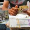 Iran’s currency hits record law amid popular uprisings