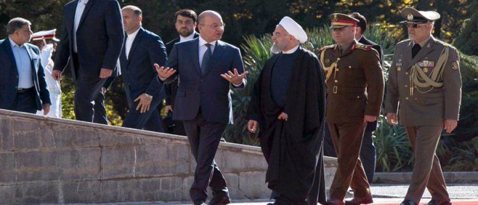 الرئيس الإيراني حسن روحاني مع نظيره العراقي برهم صالح