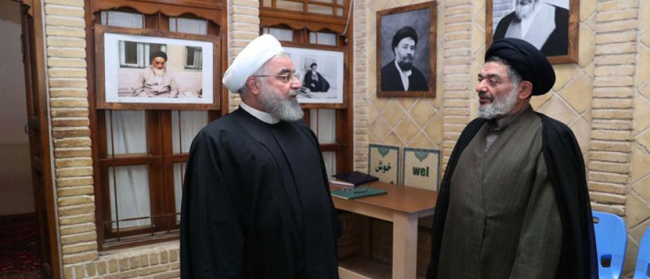 روحاني مع رجل دين إيراني
