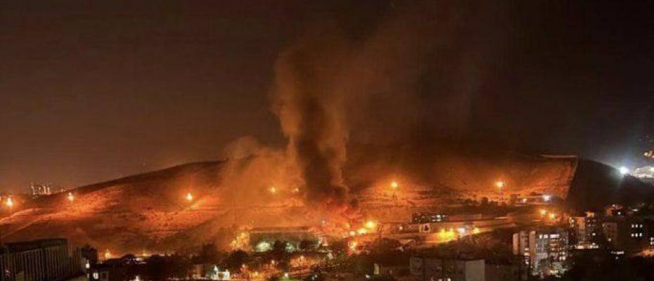 Gunfire heard as huge blaze breaks out at Iran’s notorious jail amid protests