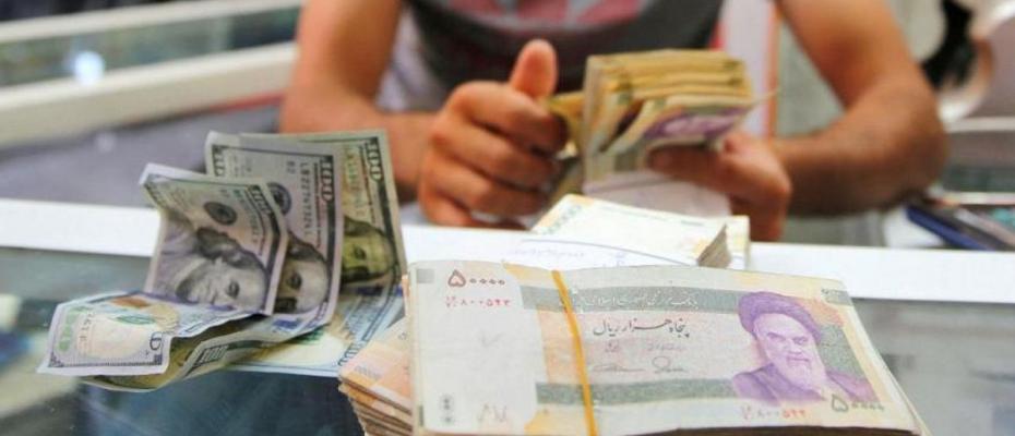 Iran’s currency hits record law amid popular uprisings